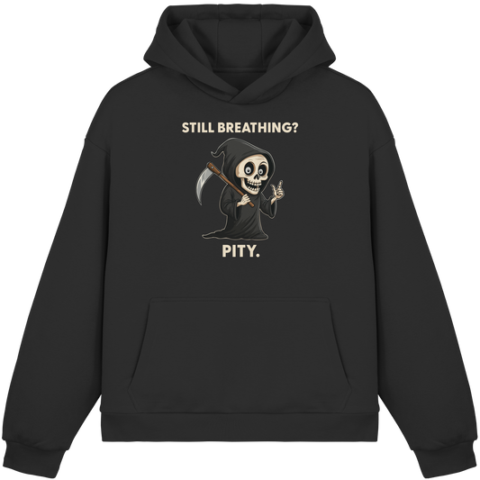Black hoodie with a sarcastic grim reaper design and the text "Still breathing? Pity.
