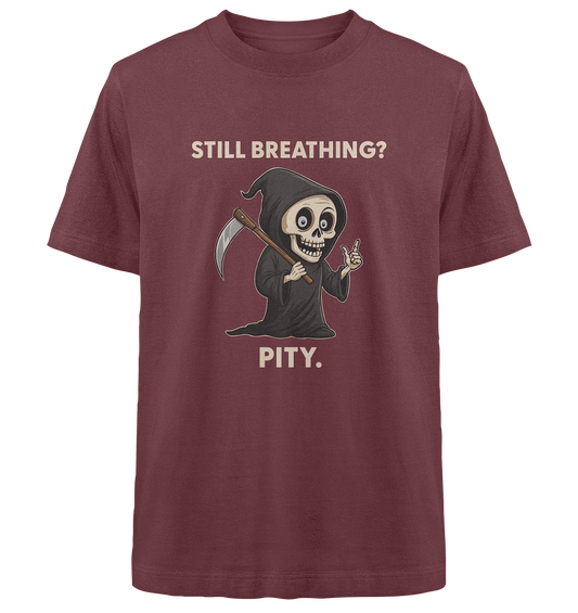 Maroon oversized shirt with a cartoon grim reaper holding a scythe and the text "Still breathing? Pity.