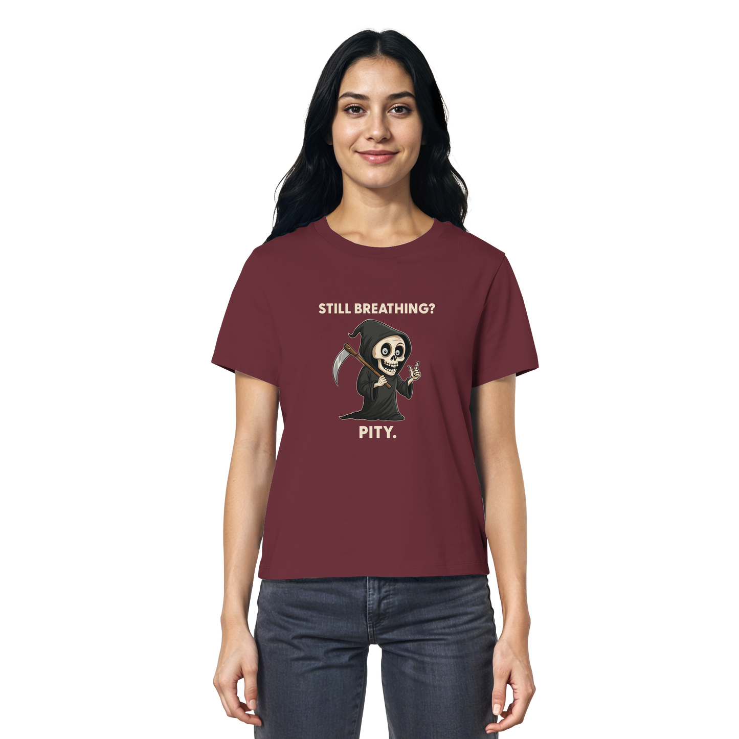Woman wearing maroon organic shirt with grim reaper illustration and sarcastic phrase about still breathing