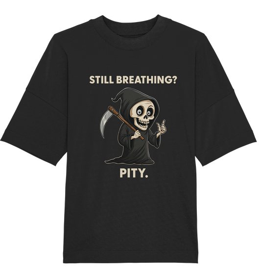 Black oversized organic shirt with a sarcastic grim reaper design and text "Still breathing? Pity.