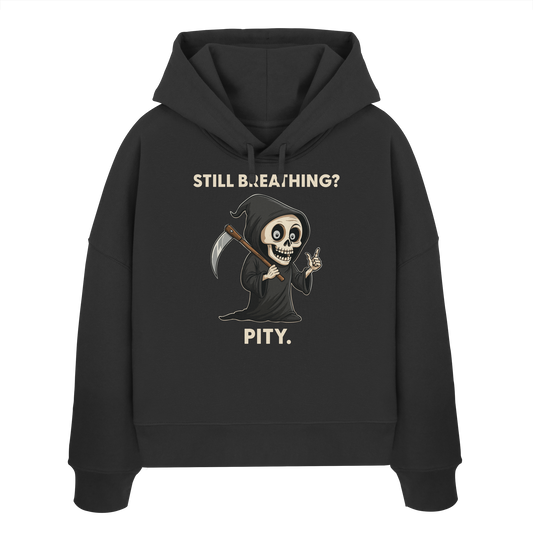 Black organic women's hoodie with sarcastic grim reaper design and text "Still breathing? Pity.